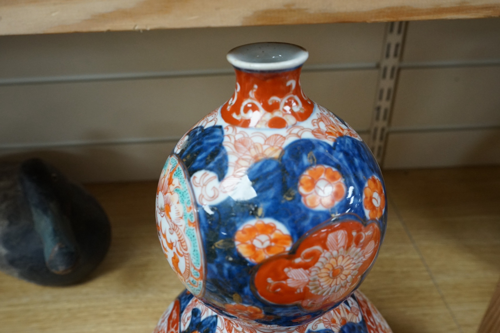 A Japanese Imari double-gourd vase, 31cm high. Condition - good, a little worn